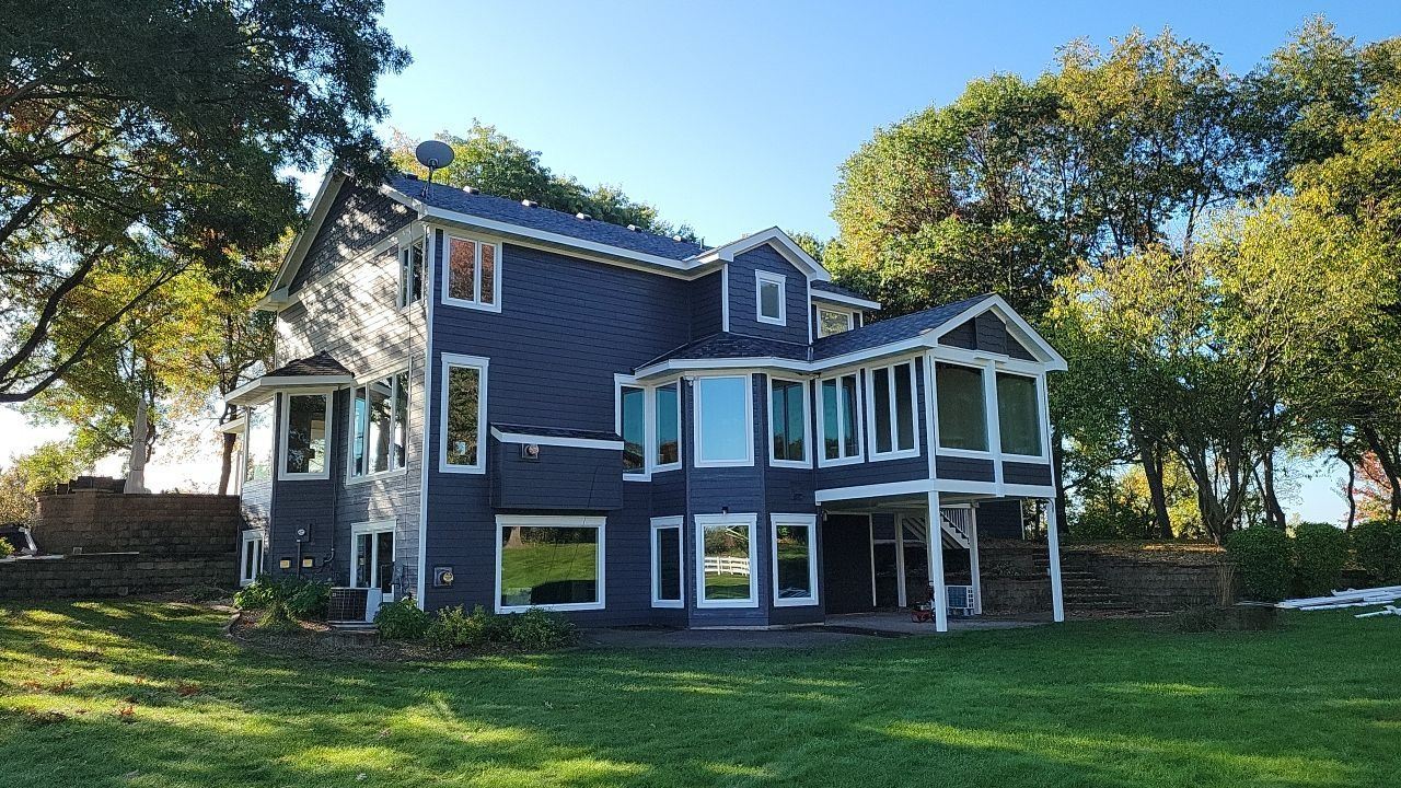 Beautiful blue siding with white trim