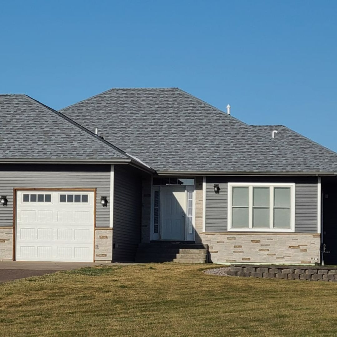 Ranch home roofing and siding